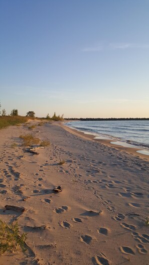 On the beach, sun loungers, beach towels - Beautiful, Private, Lakeshore Home- perfect for large families! (Ludington)