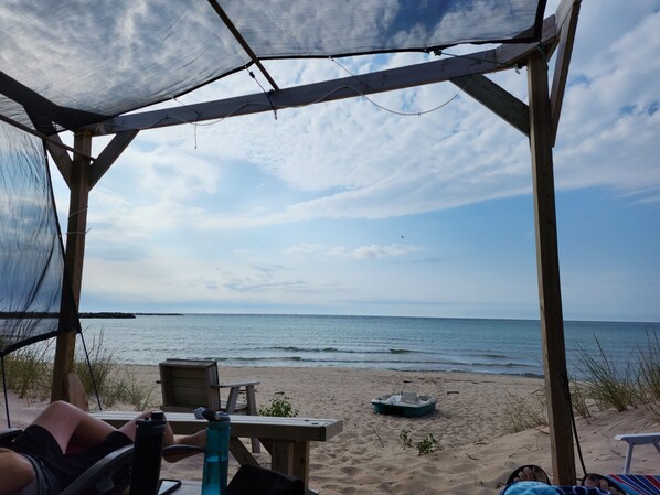 On the beach, sun-loungers, beach towels