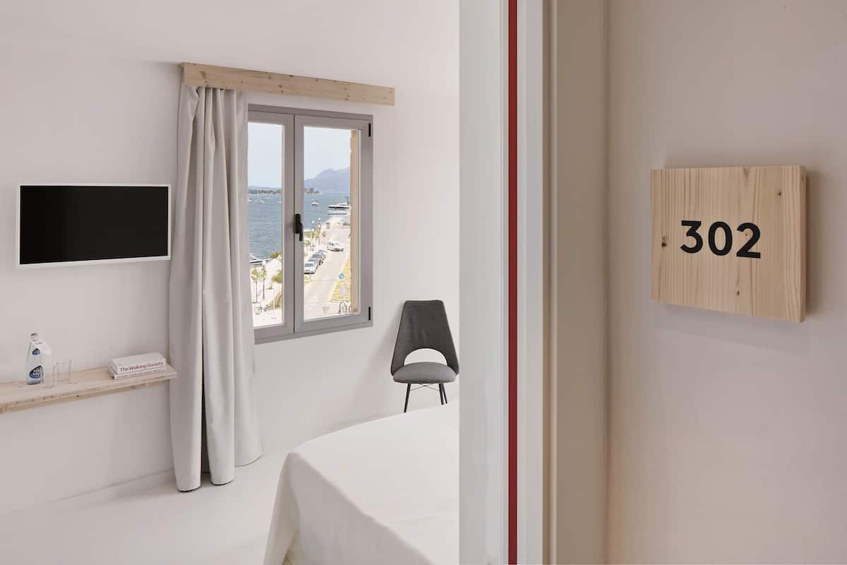 Standard Single Room, Ocean View | Minibar, in-room safe, iron/ironing board, free WiFi