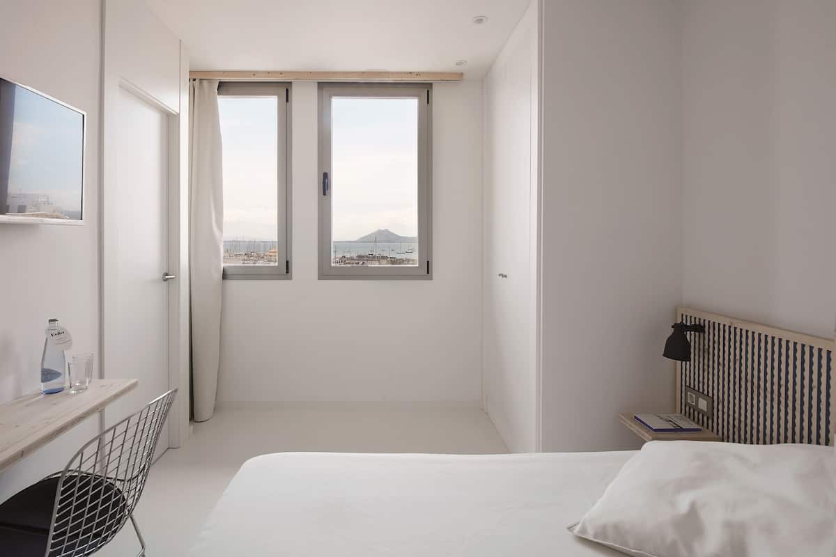 Standard Twin Room, Sea View | Minibar, in-room safe, iron/ironing board, free WiFi