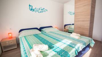 Basic Apartment, Lake View | In-room safe, blackout drapes, soundproofing, iron/ironing board