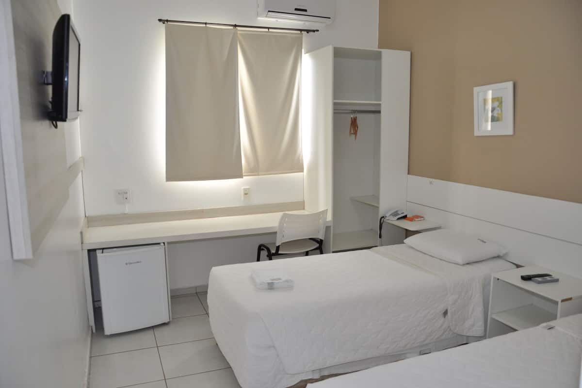 executive twin room, garden view | minibar, rollaway beds, free wifi, bed sheets