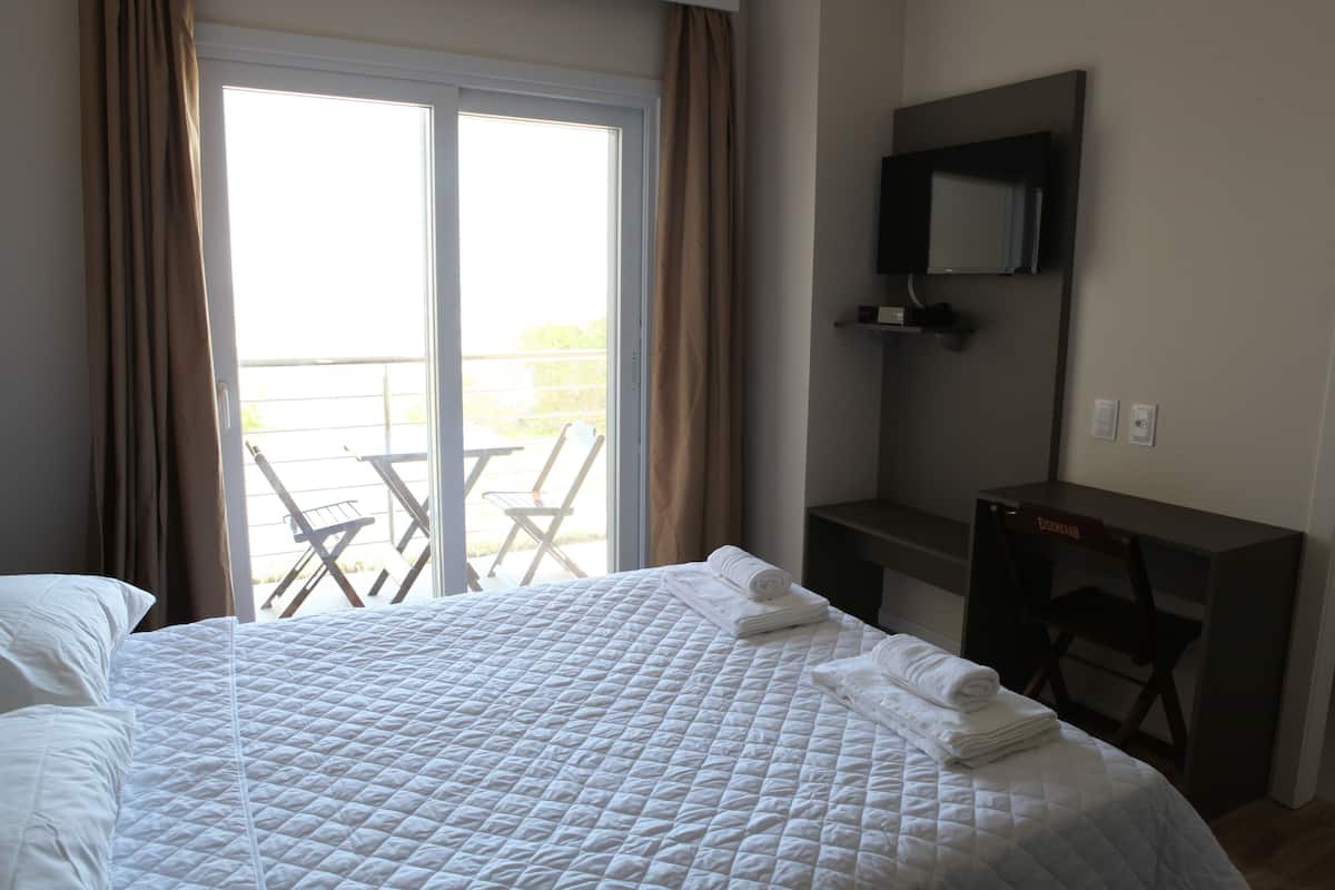 Habitación doble Deluxe | Minibar, escritorio, cortinas blackout y wifi gratis