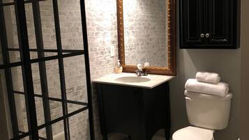Combined shower/tub, hair dryer, towels, soap