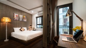 Suite familiare, balcone | Area soggiorno