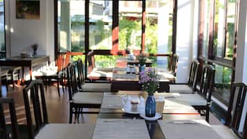 Breakfast, lunch, dinner served; local cuisine