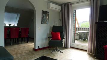 Comfort Apartment, Balcony, Mountain View | Living area | Flat-screen TV, MP3 dock