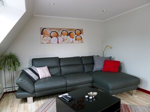Comfort Apartment, Balcony, Mountain View | Living area | Flat-screen TV, MP3 dock - FeWo-Schuberski (Oerlinghausen)
