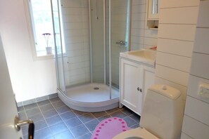 Regadera, jabón, papel de baño 