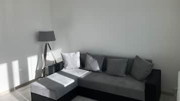 Premium Apartment, Multiple Beds, Mountain View | Living area | TV