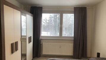 2 bedrooms, desk, laptop workspace, free cots/infant beds