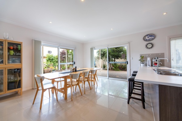 Dining table downstairs seats 10. Go out into undercover entertainment area /BBQ