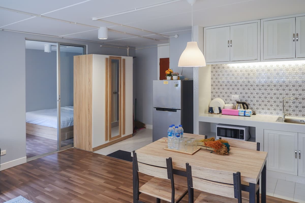 Family Room, Multiple Beds, Garden View | Desk, laptop workspace, free WiFi, bed sheets