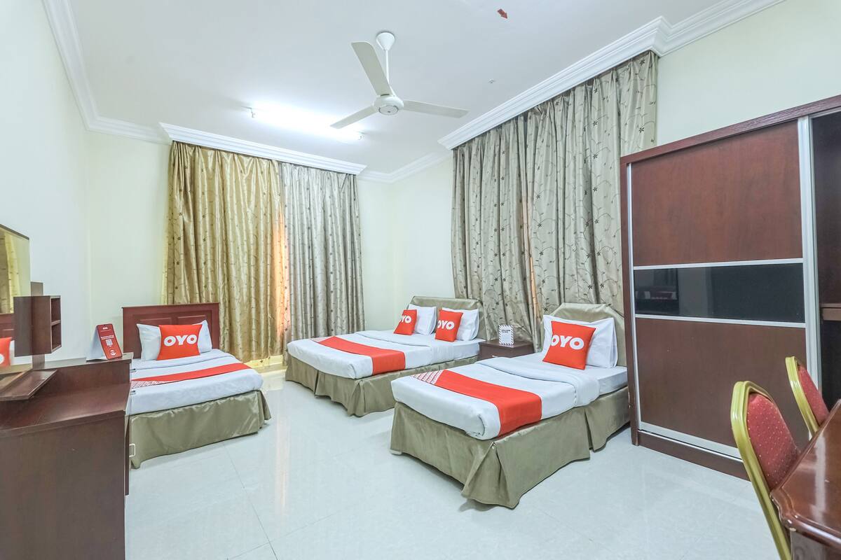 Standard Apartment, 3 Bedrooms | In-room safe, desk, laptop workspace, blackout drapes