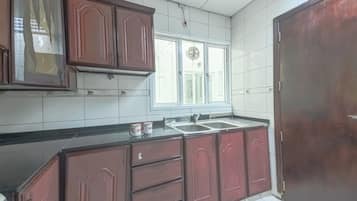 Standard Apartment, 2 Bedrooms | Private kitchen | Fridge