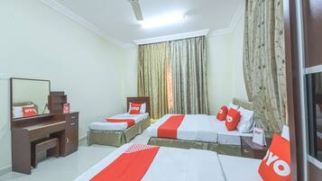 Standard Apartment, 3 Bedrooms | In-room safe, desk, laptop workspace, blackout drapes