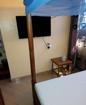 Kamar Single Basic | 1 kamar tidur, seprai premium, setrika/meja setrika, dan Wi-Fi gratis