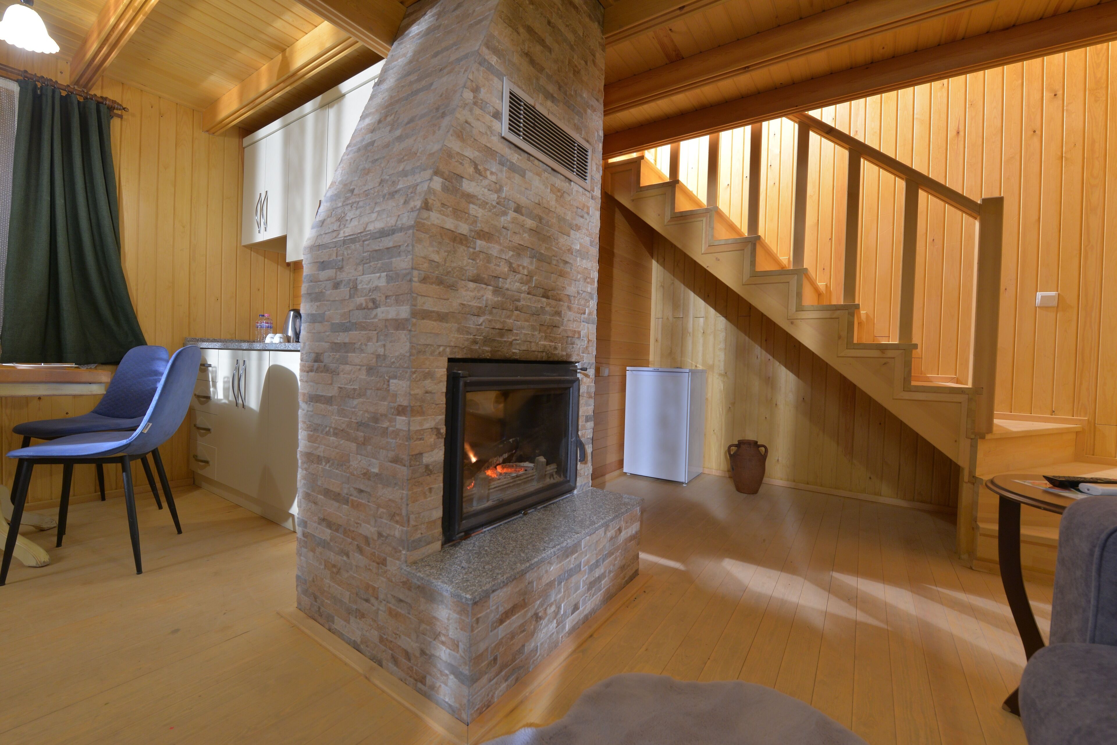 bungalow, fireplace | living area | lcd tv