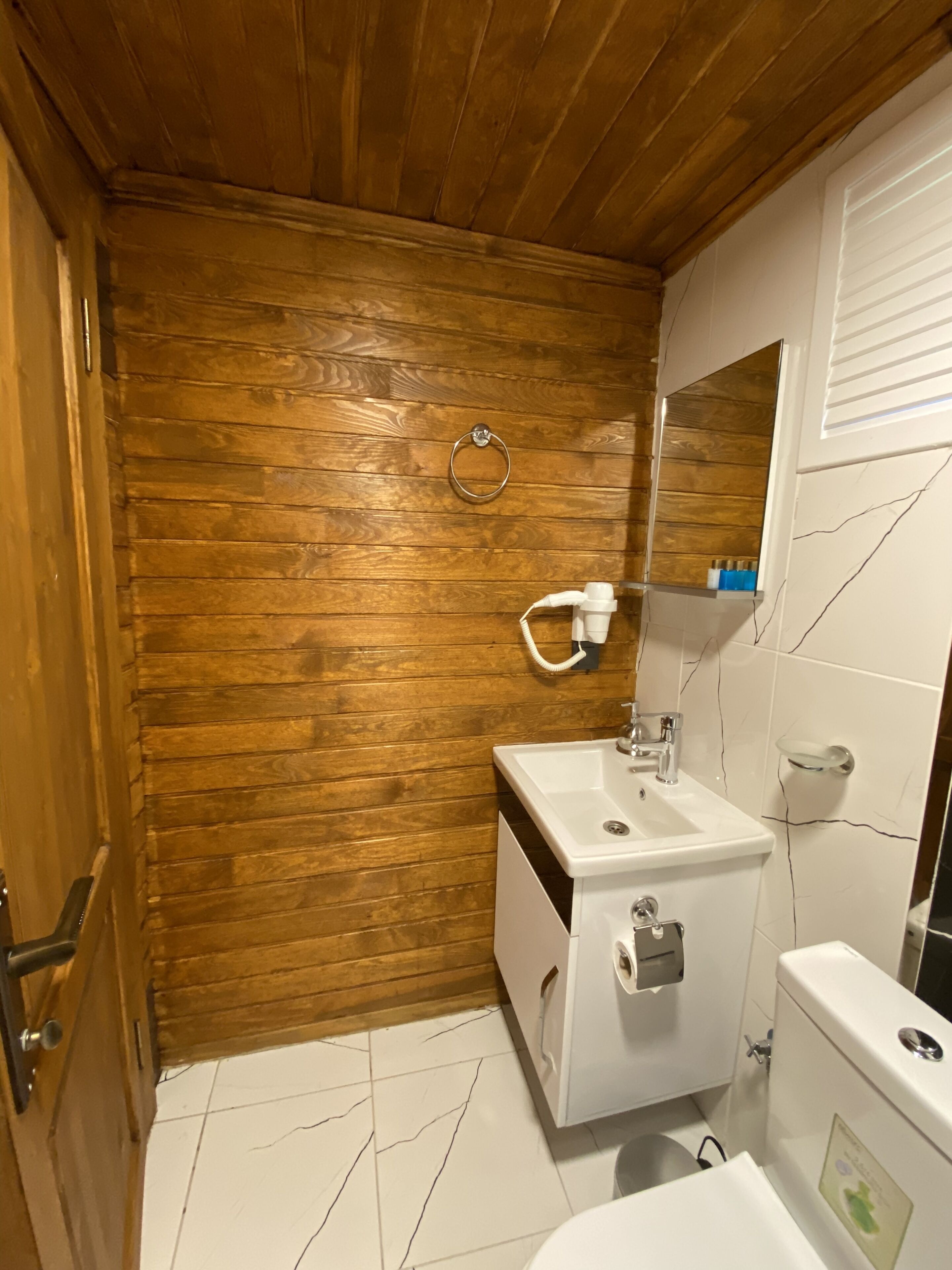 bungalow, garden area | bathroom | shower, free toiletries, hair dryer, slippers