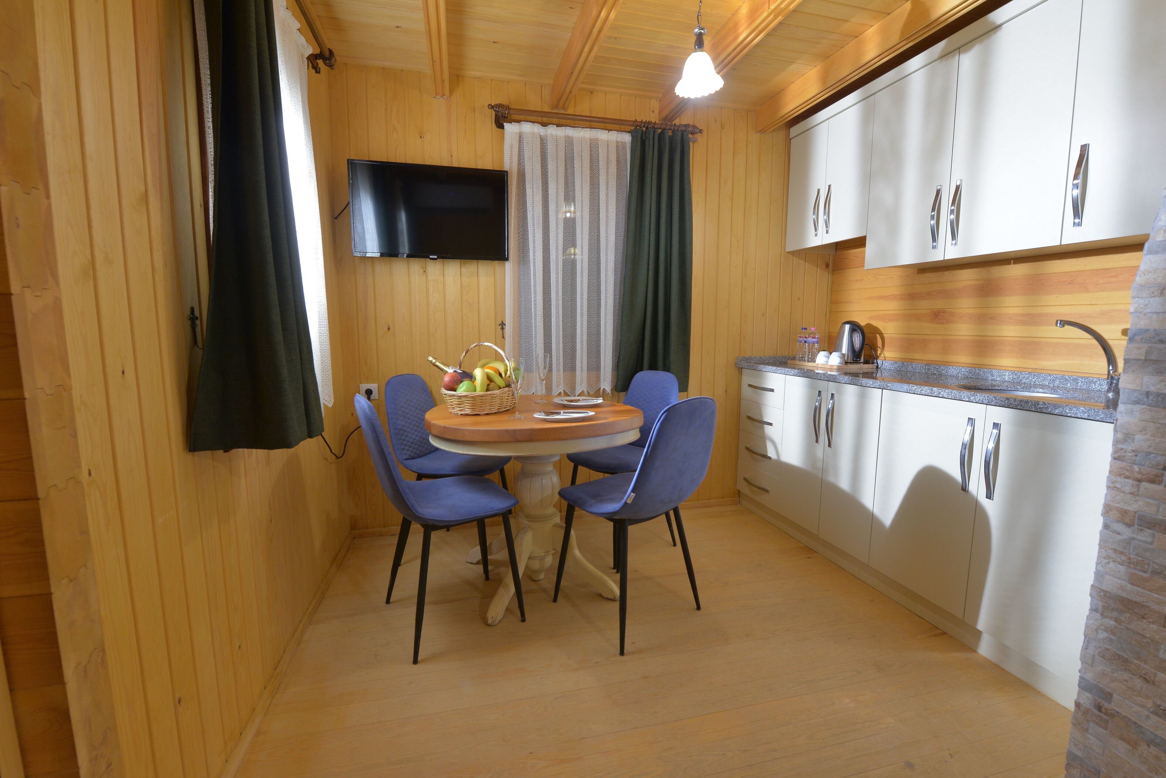 bungalow, fireplace | living area | lcd tv