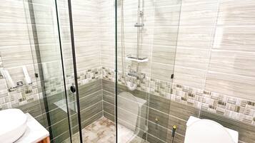 Signature Double Room | Bathroom | Shower, hair dryer, slippers, towels
