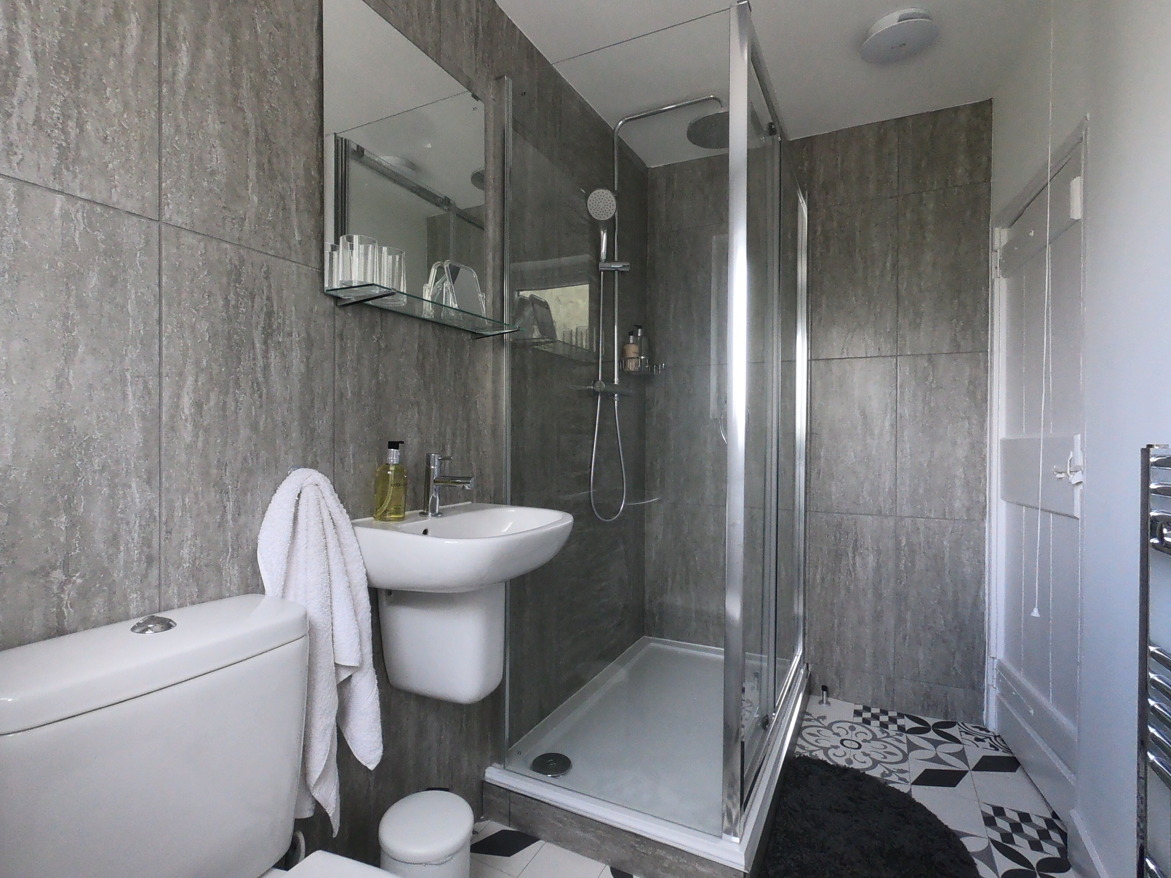 Shower, hair dryer, bathrobes, towels
