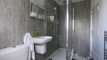 Shower, hair dryer, bathrobes, towels