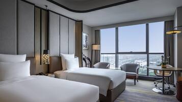 Premium bedding, down duvets, pillow-top beds, minibar
