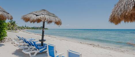 On the beach, beach towels