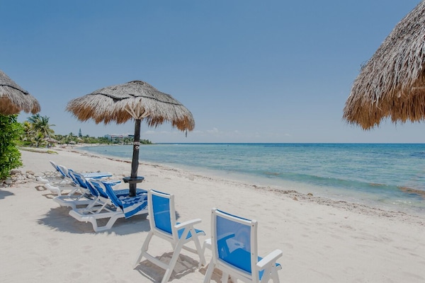 En la playa, toallas de playa