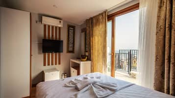 Double Room, Terrace, Sea View | Minibar, in-room safe, desk, blackout drapes