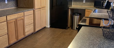 Microwave, coffee/tea maker, cookware/dishes/utensils