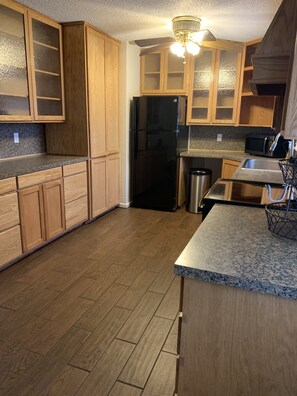 Microwave, coffee/tea maker, cookware/dishes/utensils