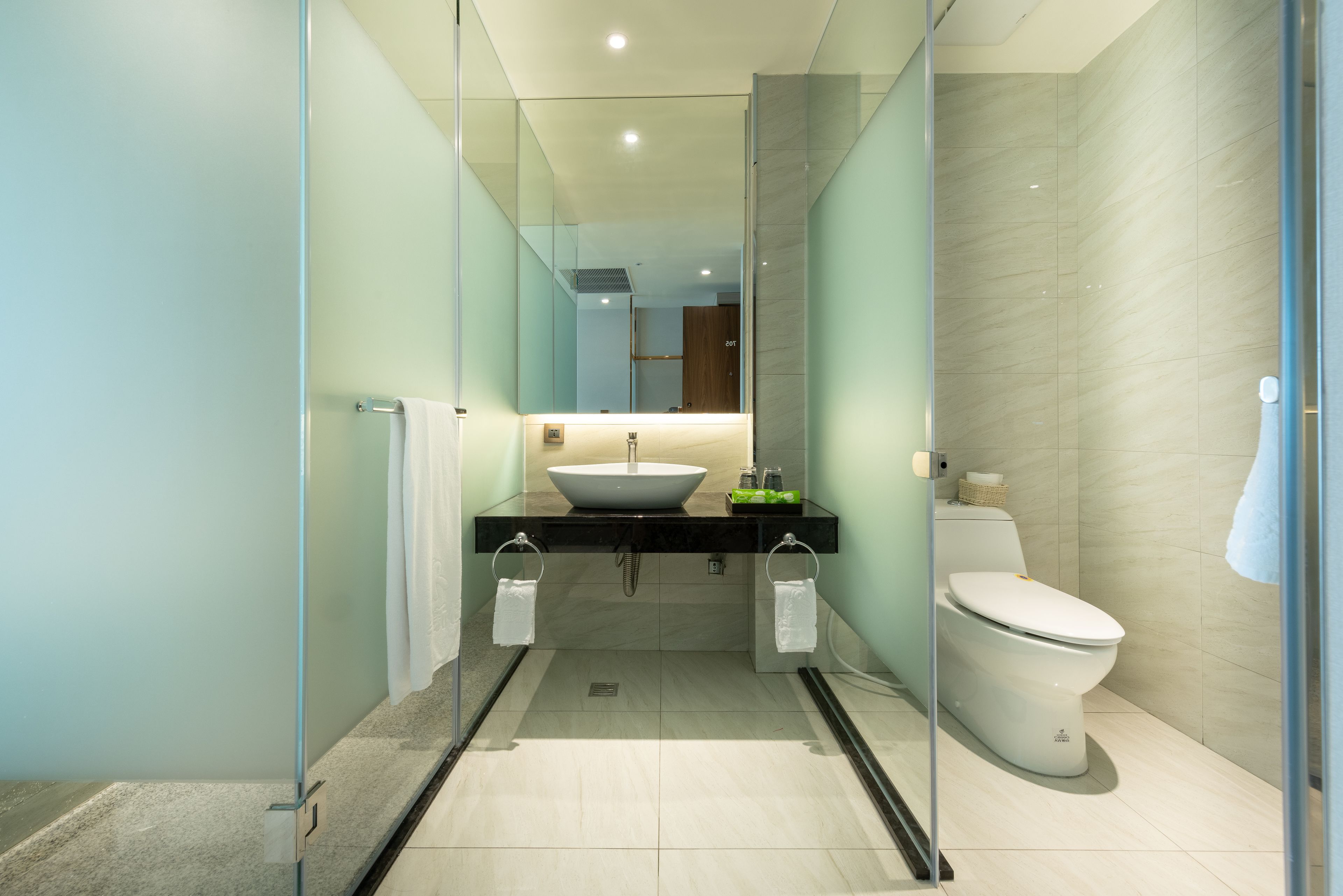 superior quadruple room | bathroom amenities | shower, free toiletries, hair dryer, slippers