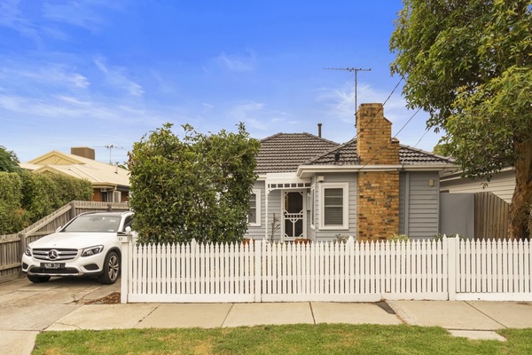 Facade
Quiet tree lined street with off street parking