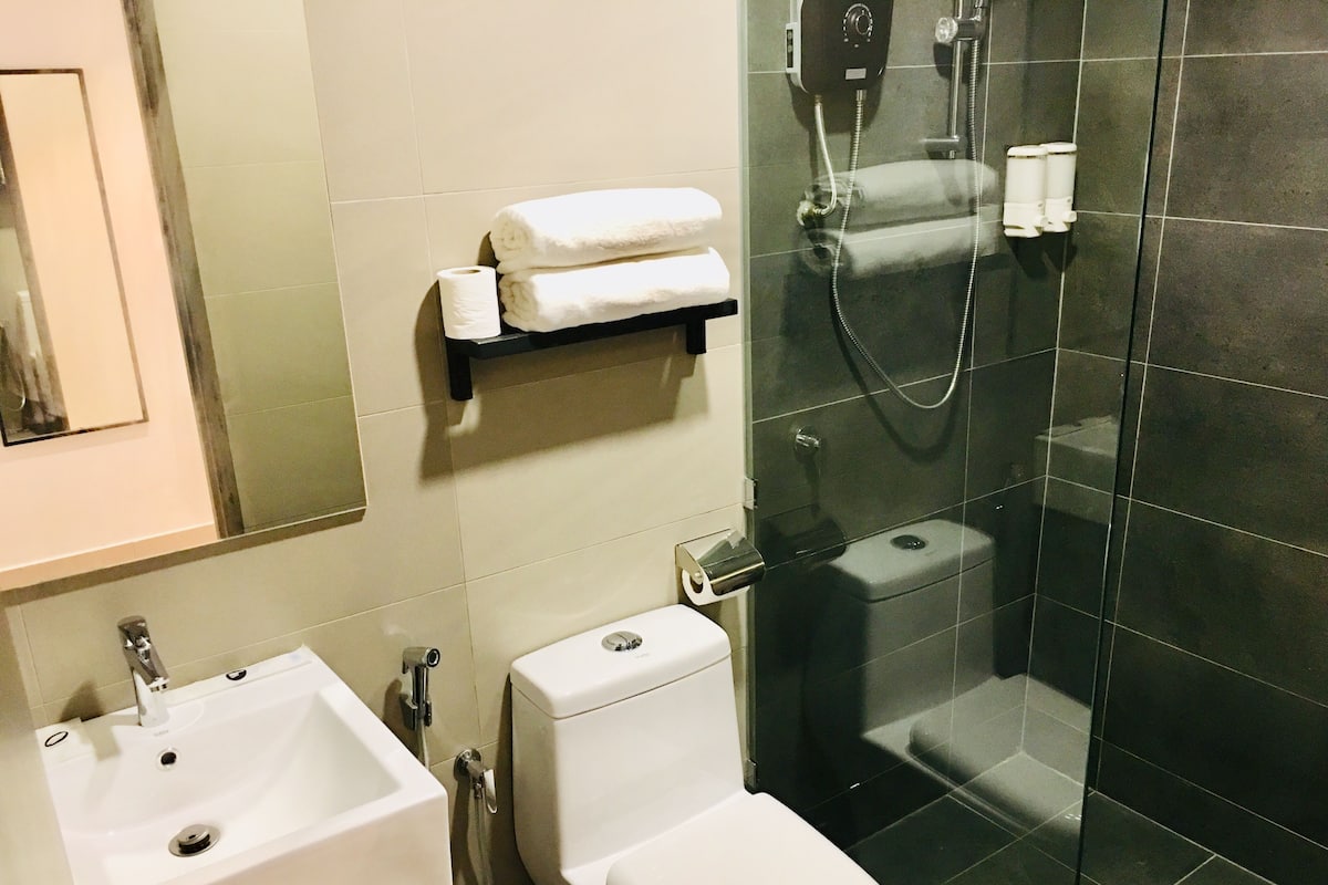Hair dryer, bidet, towels, soap