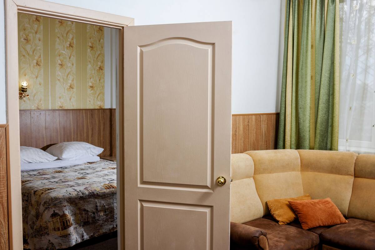 Kamar Keluarga, 1 Tempat Tidur Double, pemandangan kota | Area keluarga | Televisi layar datar 32-inci dengan saluran TV digital