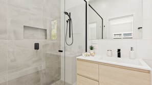 Bathtub, hair dryer, towels