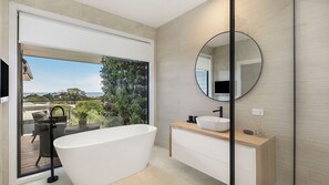 Bathtub, hair dryer, towels