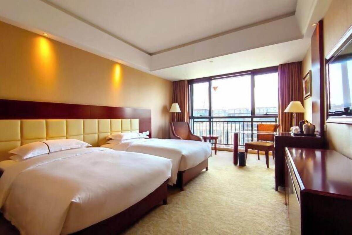 Desk, blackout curtains, free WiFi, bed sheets