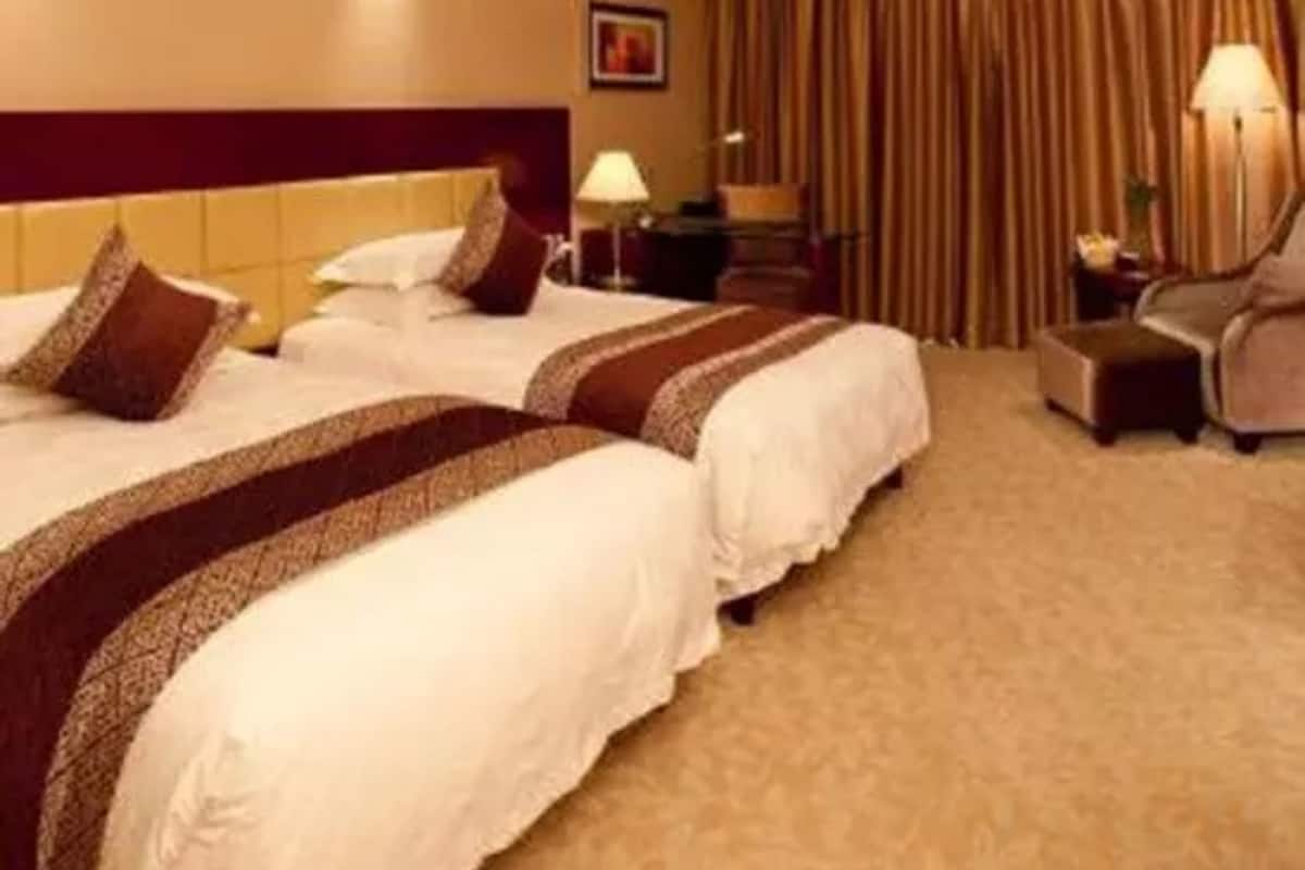 Quarto duplo executivo | Escrivaninha, cortinas blackout, Wi-Fi de cortesia, roupa de cama