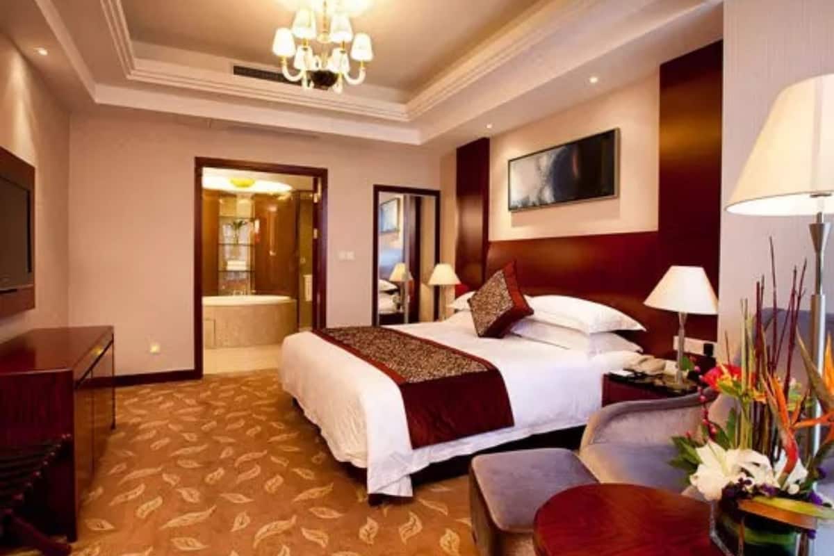 Escrivaninha, cortinas blackout, Wi-Fi de cortesia, roupa de cama
