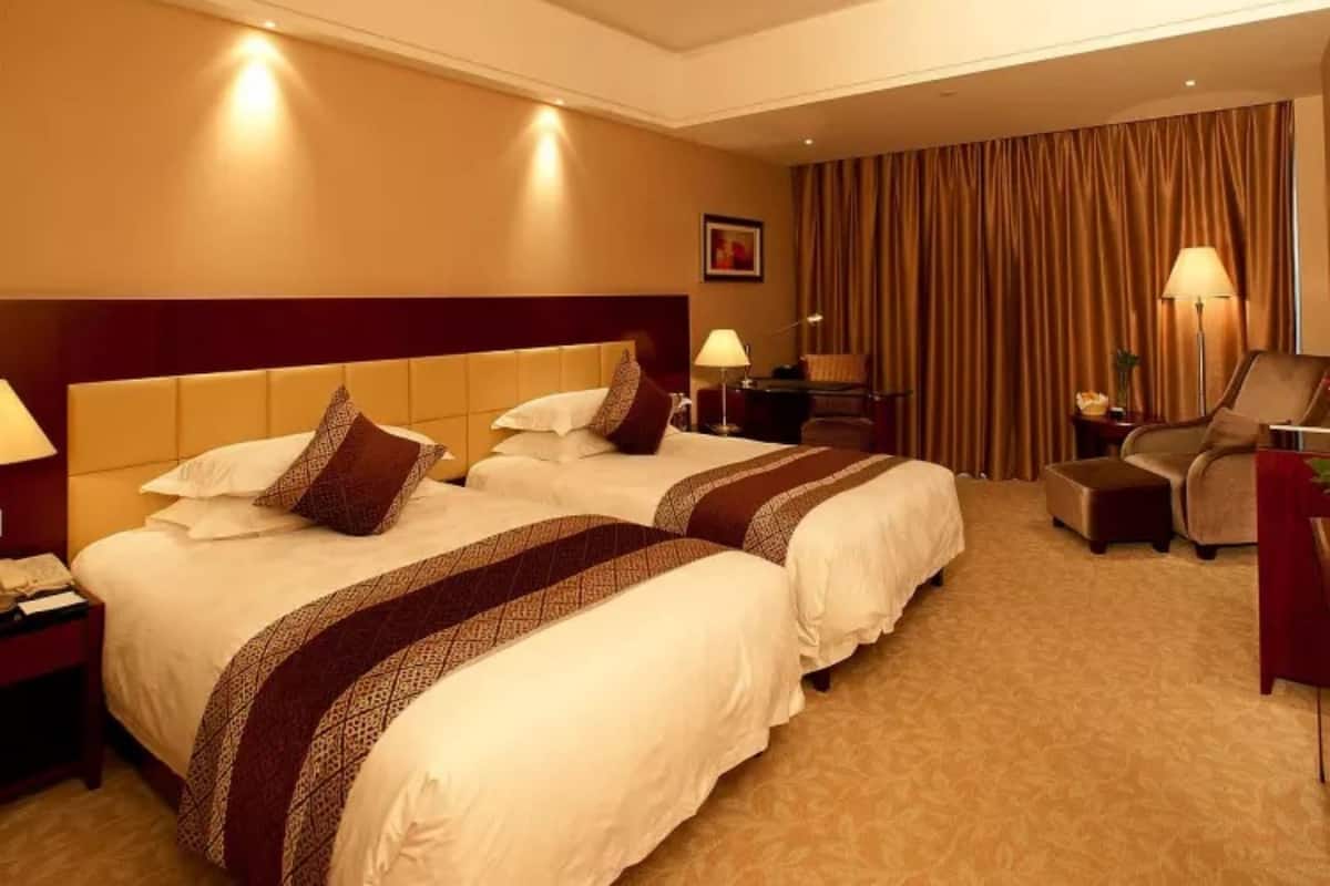 Escrivaninha, cortinas blackout, Wi-Fi de cortesia, roupa de cama