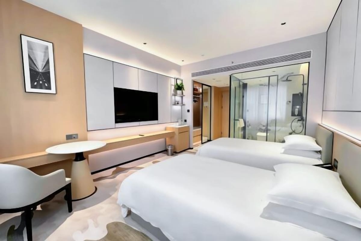 Desk, blackout curtains, free WiFi, bed sheets