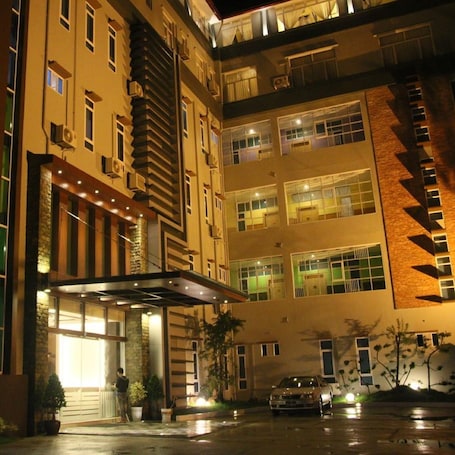 Front of property - evening/night. Golden Guest Hotel Dawei