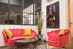 Gallery Apartment, Multiple Beds | Living area | 32-inch flat-screen TV with satellite channels, TV - JI Tel Aviv Center (Tel Aviv)