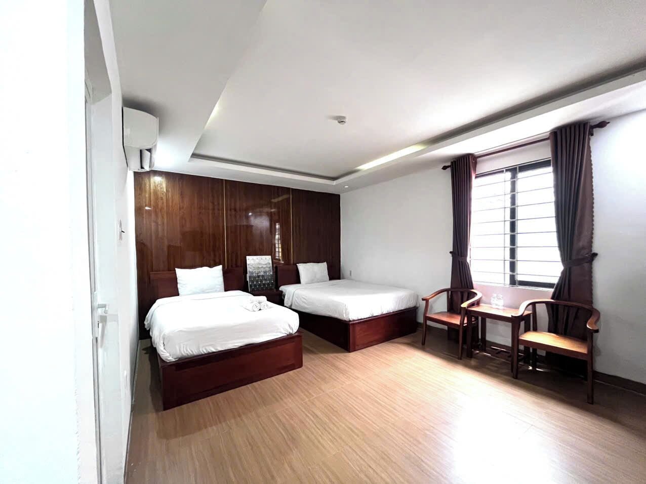 Family Room, City View | Minibar, in-room safe, desk, blackout drapes
