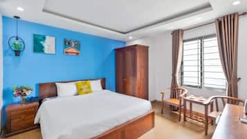 Habitación Deluxe doble | Minibar, caja fuerte, escritorio y cortinas opacas