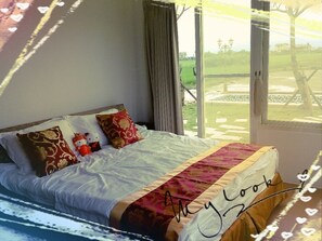 Premium bedding, desk, laptop workspace, blackout curtains