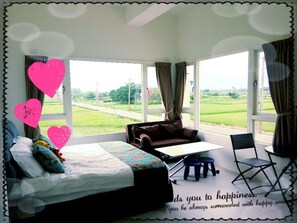 Premium bedding, desk, laptop workspace, blackout curtains